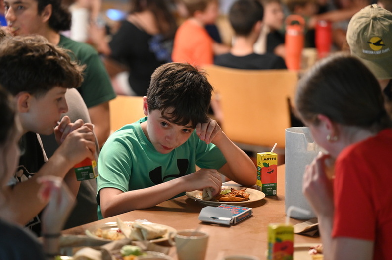 Campers eating together in the dining hall